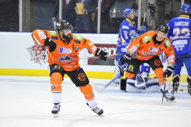 GOOD TIMING: Mathieu Roy celebrates his game-winning goal against Hull Stingrays with just over three seconds left on the clock. Picture: Dean Woolley.
