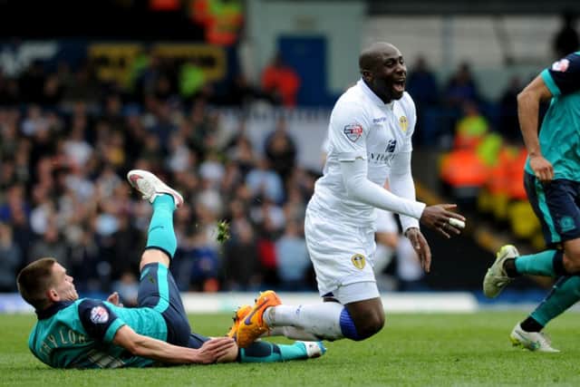Sol Bamba is taken down by Paul Taylor. (Picture: Bruce Rollinson)