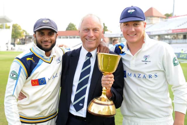 Adil Rashid, left, with Colin Graves and Gary Ballance after the 2014 title win.