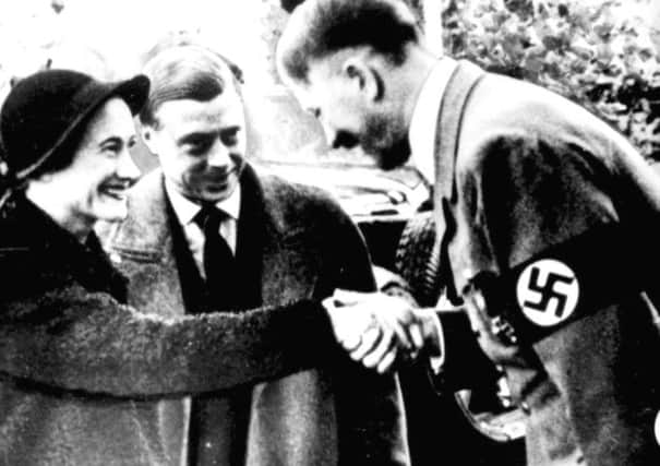 The Duke and Duchess of Windsor meeting Hilter in 1937.  (PA).