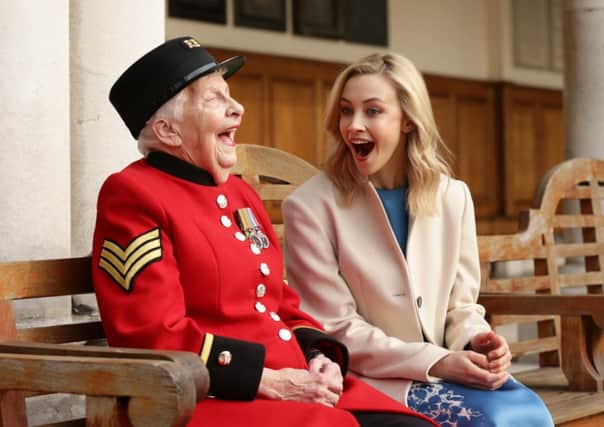 Sarah Gadon (right), star of the film A Royal Night Out, with Chelsea Pensioner Dorothy Hughes - who was one of the first female residents at the Royal Hospital and celebrated V.E. day in Trafalgar Square