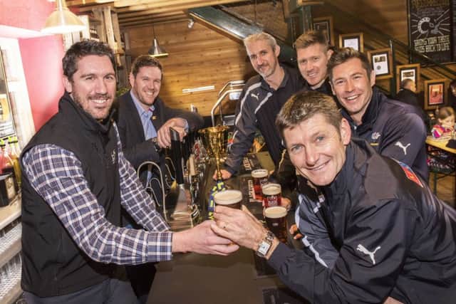 raising a glass to a successful partnership: Black Sheep Brewery promote their beers at Headingley as Martyn Moxon, Andrew Hodd, Richard Pyrah and Jason Gillespie relax with a pint after a tour of the famous brewery in Masham