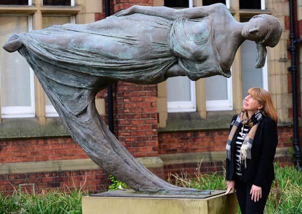 Ann Sumner pictured with The Dreamer, by Quentin Bell, at the University of Leeds. (Picture: Scott Merrylees).
