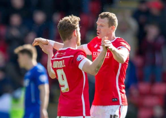 Sam Winnall is congratulated by Peter Ramage. (Picture: James Williamson)