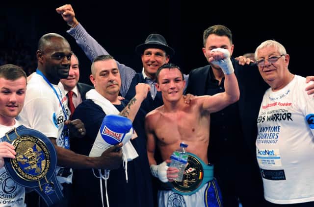Josh Warrington with his WBC International Featherweight title belt at the Leeds Arena on Saturday.