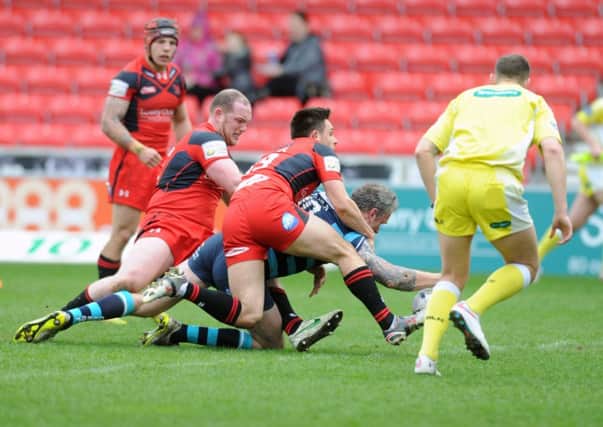 Jamie Peacock scores his first try for Leeds at Salford. (Picture: Steve Riding).