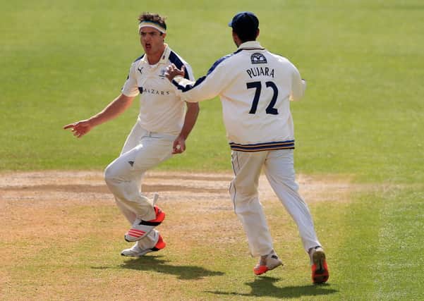 Yorkshire's bowler Jack Brookes (left) celebrates taking the wicket of Worcestershire opening batsman Richard Oliver. Picture: Nick Potts/PA.