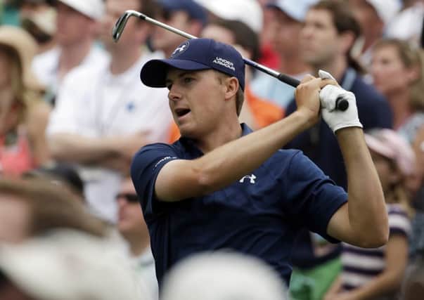 Jordan Spieth watches his tee shot on the sixth hole during the fourth round of The Masters.