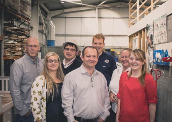 Key Fund: Andy Simpson, CEO of Doncaster Refurnish (centre) with the Refurnish team.