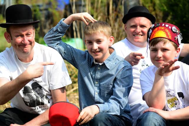 9 April 2015..........The Laurel and Hardy Convention  is going to be held in Sheffield in May. John Burton and Mark Johnson, pictured with their sons John and Oliver, run the Sheffield branch of the Sons of the Desert  society.  Picture Scott Merrylees SM1008/04e.