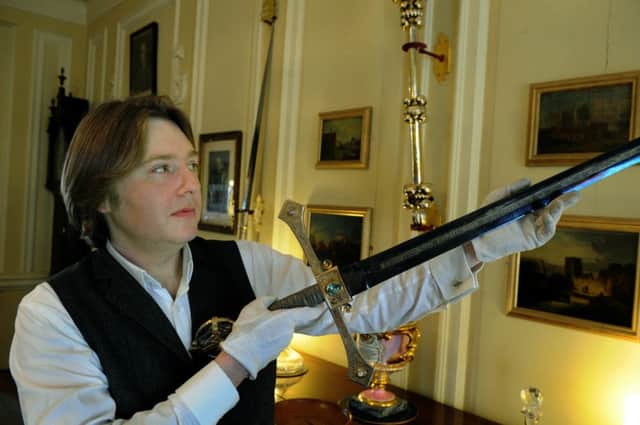 Mansion House manager Richard Pollitt with a ceremonial sword that will go on display in a purpose-built cabinet in the Dining Room