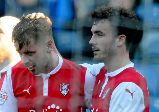 Farrend Rawson, right, the player at the centre of the ineligibility claim, is seen with Rotherham United team-mate Kari Arnason (Picture: James Hardisty).