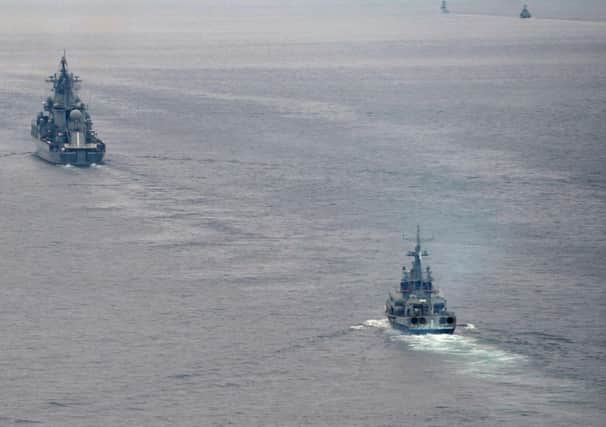 Russian Pacific Navy ships sail near the Sakhalin Island during military exercises in 2013.