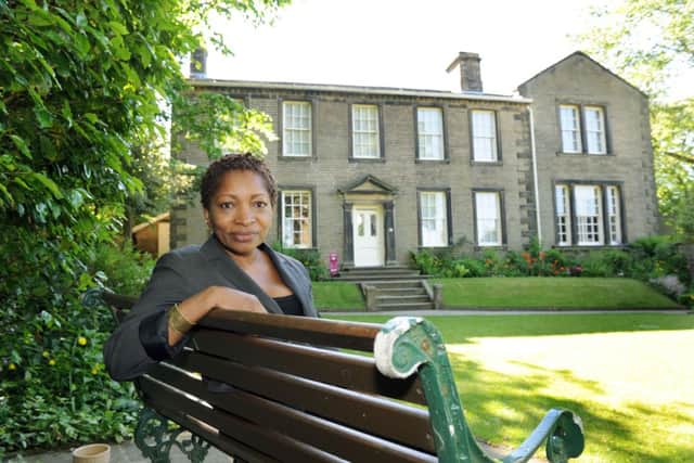 Bonnie Greer, President of the Bronte Society,  in the garden of the Bronte Parsonage at Haworth.
