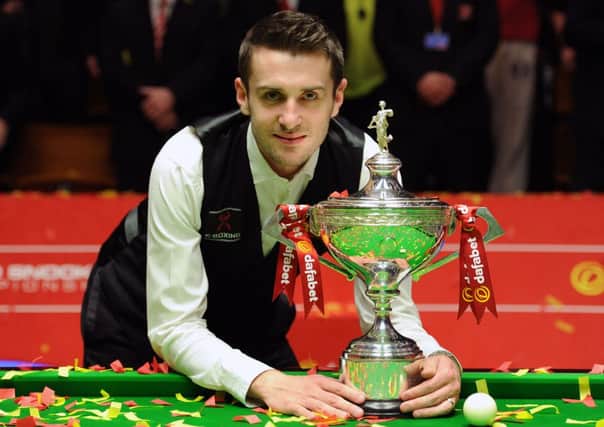 Defending champion Mark Selby.