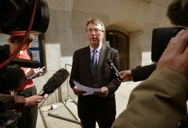 Journalist Graham Brough leaves the Old Bailey in London