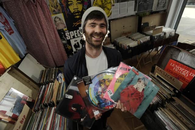 Alan Nutton of Wah Wah Records in Brook Street, Wakefield, with some of the special edition vinyl albums which he will be selling as part of Record Store Day.  Picture by Bruce Rollinson