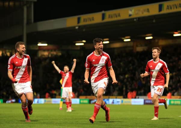 Middlesbrough's Daniel Ayala, centre, celebrates with team-mates after victory at Norwich last night (Picture: Stephen Pond/PA Wire).