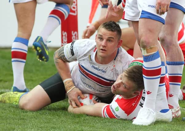 FIRST STRIKE: Opening try of the match for Wakefield's Richard Owen. Picture: Andy May.