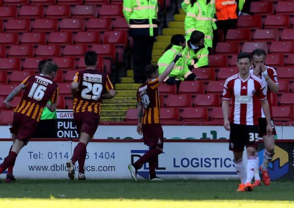 Billy Clarke celebrates scoring a late equaliser for Bradford City against Sheffield United at Bramall Lane (Picture: martyn Harrison).