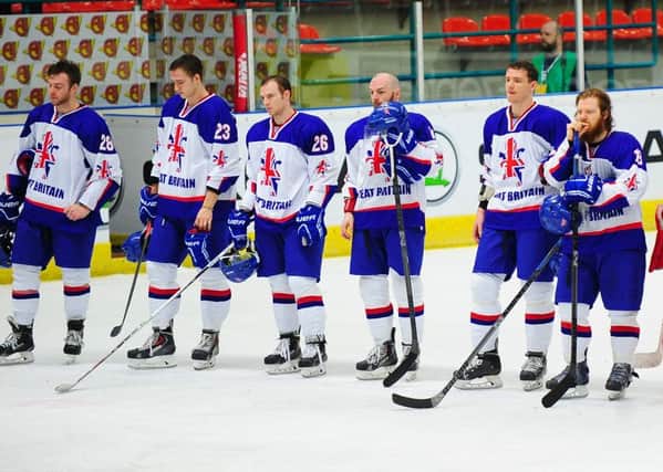 GB's players show their disappointment after missing out on a gold medal and promotion at the World Championships Division 1B tournament in Eindhoven. Picture: Colin Lawson.