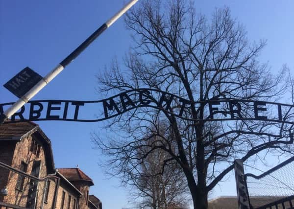Arbeit Macht Frei - work sets you free- is written above the gates to Auschwitz.