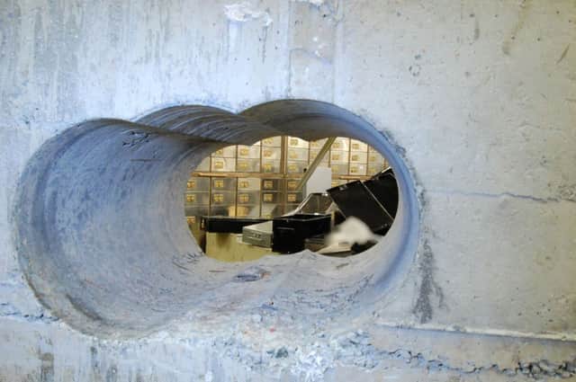 Police pictures of the vault door at the Hatton Garden Safe Deposit company which was robbed over the Easter weekend.