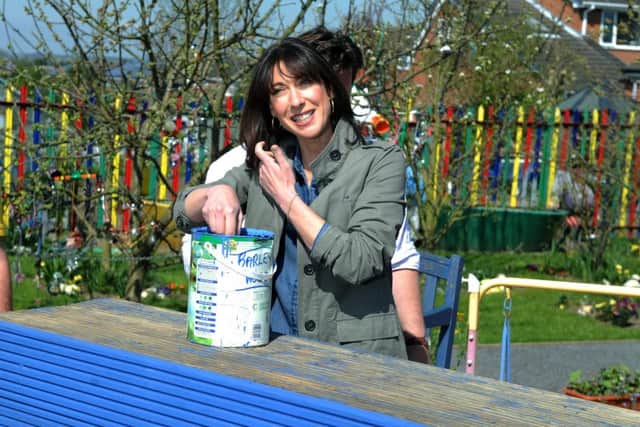 Samantha Cameron is put to work at The Growing Zone, in Kippax today, Picture: Jonathan Gawthorpe