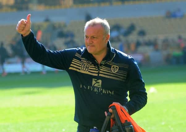 Leeds United head coach Neil Redfearn acknowledging the fans whose support, he says, has "definitely helped me through this season. (Picture: Simon Hulme).