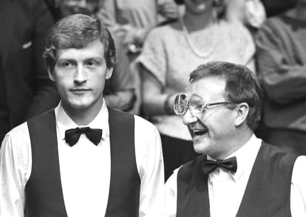 Steve Davis (left) with Dennis Taylor following their epic world championship final in 1985. (PA).