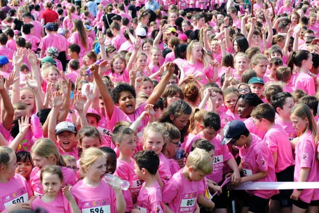 2,000 school children took part in a Run For Fun to raise money in memory of Ann Maguire, at St Theresa's Catholic Primary School in Leeds.
