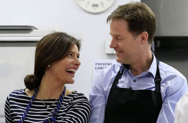 Miriam Gonzalez Durantez and husband Nick Clegg make apple and blackberry crumble during a visit to a school