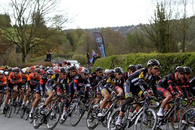 The peloton pass through Hackness during the Tour de Yorkshire between Bridlington and Scarborough. (Picture: Richard Sellers/PA Wire.)