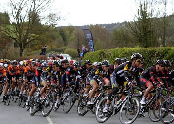 The peloton pass through Hackness during the Tour de Yorkshire between Bridlington and Scarborough. (Picture: Richard Sellers/PA Wire.)