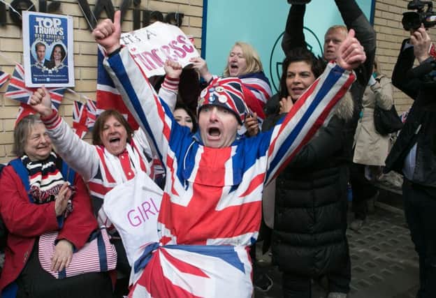 Royal fans and wellwishers react outside the Lindo Wing of St Mary's Hospital