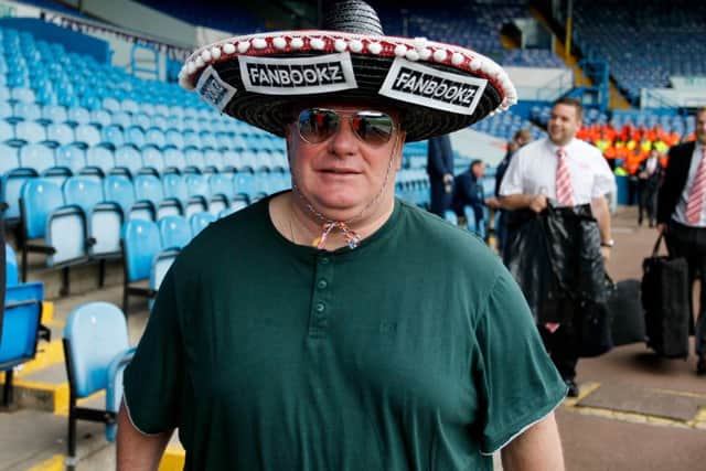 Rotherham Manager, Steve Evans arrives at at Elland Road in beach attire and a Sombrero.