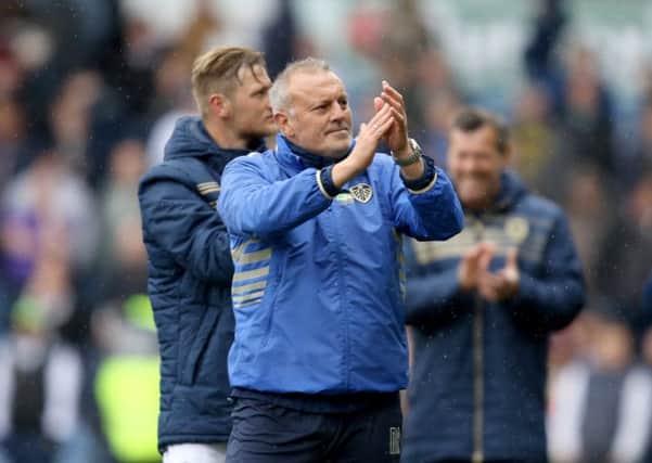 Leeds United manager, Neil Redfearn applauds the fans.