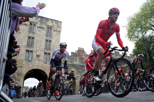 Riders pass crowds in York, during the Tour de Yorkshire between Selby and York.