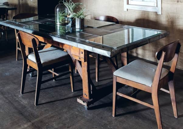 : Homes/Maker Spaces 
This table top is made from an elevator door