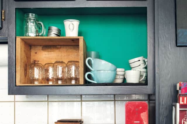 Homes/Maker Spaces 
A bright pop of green in the open shleves and the red appliances bring colour to the kitchen.