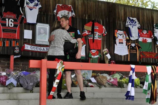 Cougars' coach Paul March with the tributes to Danny Jones. Picture by Bruce Rollinson