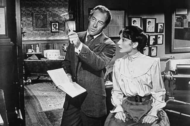 Audrey Hepburn as Eliza Doolittle and Rex Harrison as Henry Higgins in My Fair Lady