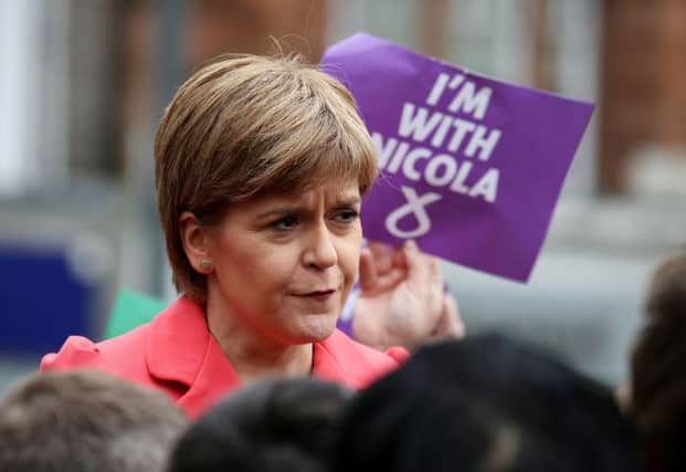 SNP leader Nicola Sturgeon speaks to party activists outside the National Galleries of Scotland in Edinburgh on the last day of the General Election campaign. (PA Wire)