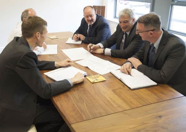 Cisdi UK Headquarters in Sheffield. The CISDI UK team, from left: Senior design engineer Darryl Wall, purchasing manager Bob Foster, quality manager John Birtles, MD John Lester and chief engineer Andrew Pence