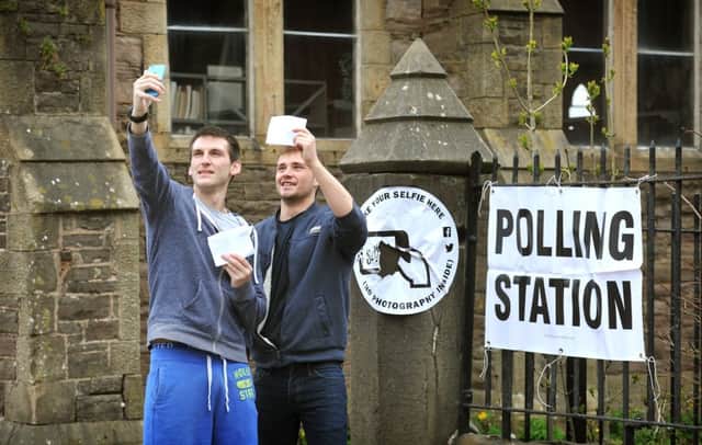 First time voters Christopher Neil and Thomas Barrett take a selfie on polling day.
