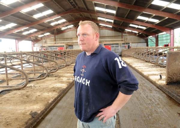 Sam Middleton in his former cow shed at his farm in Wawne.