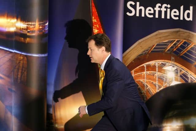 Nick Clegg prepares to speak after winning his Sheffield Hallam seat