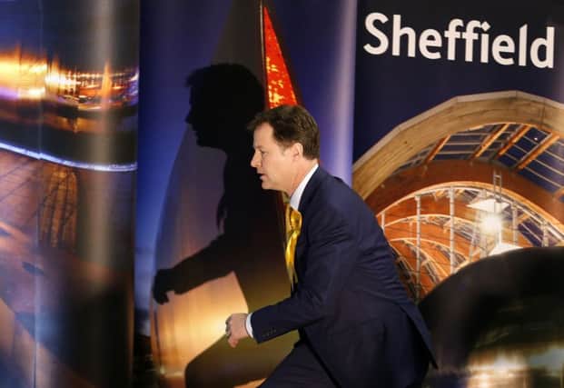 Nick Clegg prepares to speak after winning his Sheffield Hallam seat