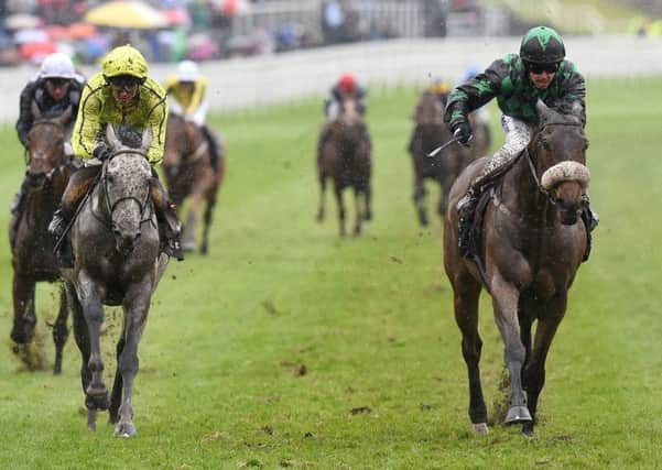 Clever Cookie ridden by Graham Lee, right, wins The Boodles Diamond Ormonde Stakes at Chester. PRESS ASSOCIATION Photo. Picture: Martin Rickett/PA