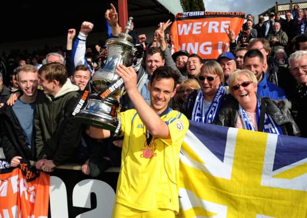 Vanarama Conference North Play -off Final.
Chorley FC v Guiseley AFC.
Guiseley's captain Andy Holdsworth celebrates with the fans.
9th May 2015.
Picture Jonathan Gawthorpe.